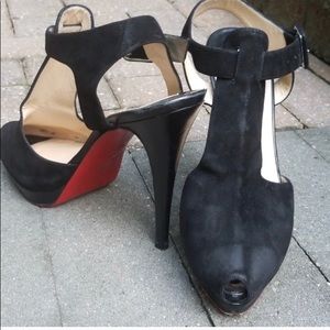 Christian Louboutin peep toe heels.